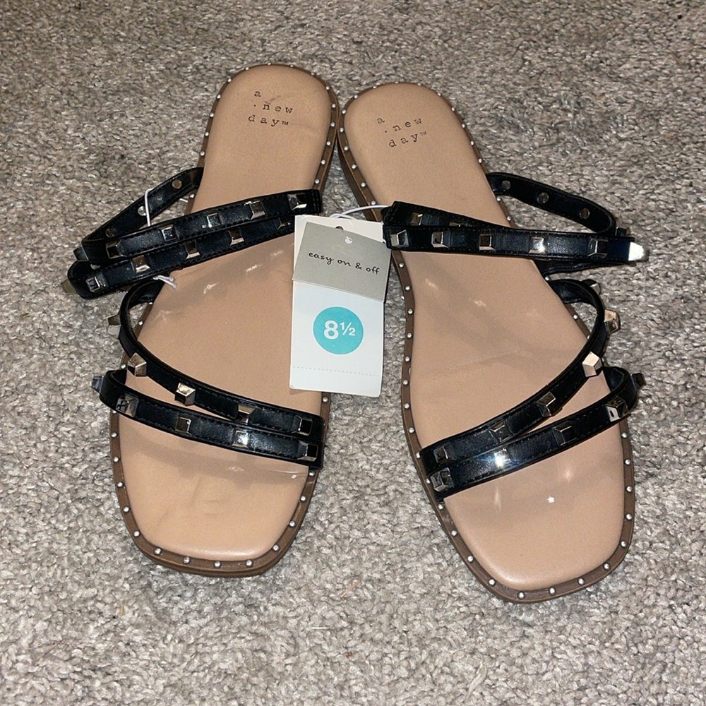 - 2/$30 A new day rock stud sandals in black and silver size 8.5